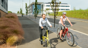 Man and woman on bikes